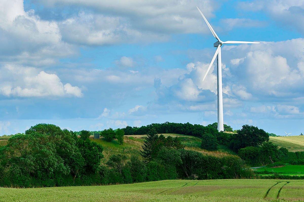 Wind turbine in a green field