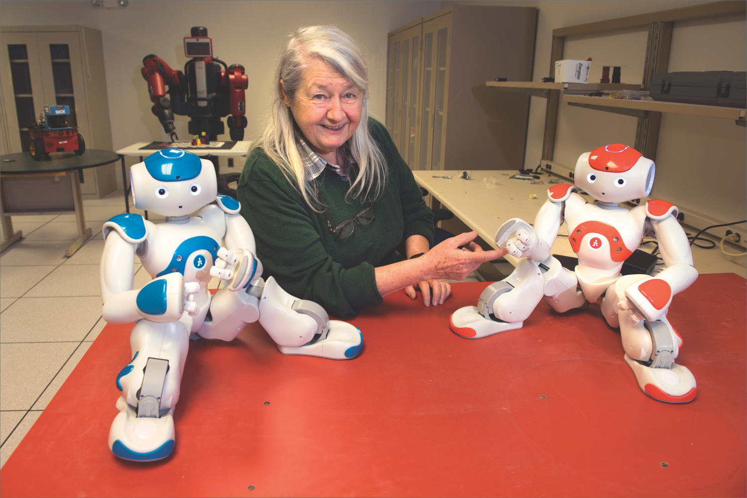 Maria Gini with two robots