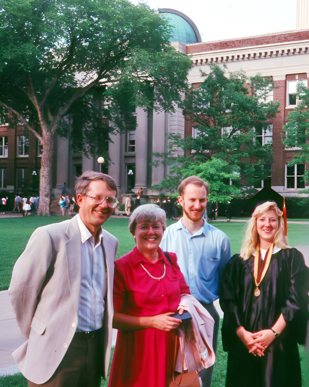 Stan and Hazelle Gordon, celebrate Kris’ graduation in 1991 with Kris’ brother Lee Gordo