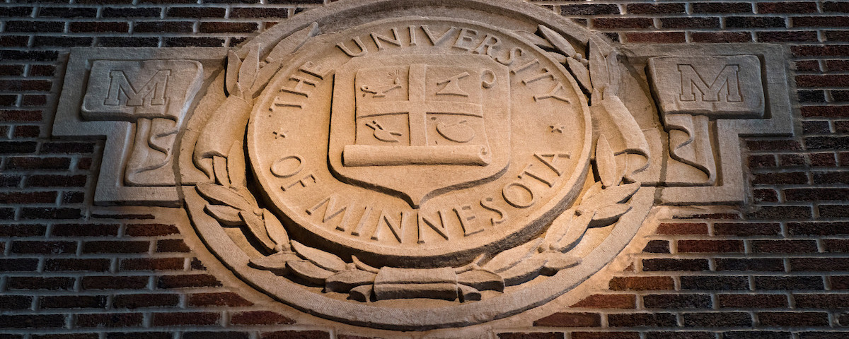 University of Minnesota seal on a building