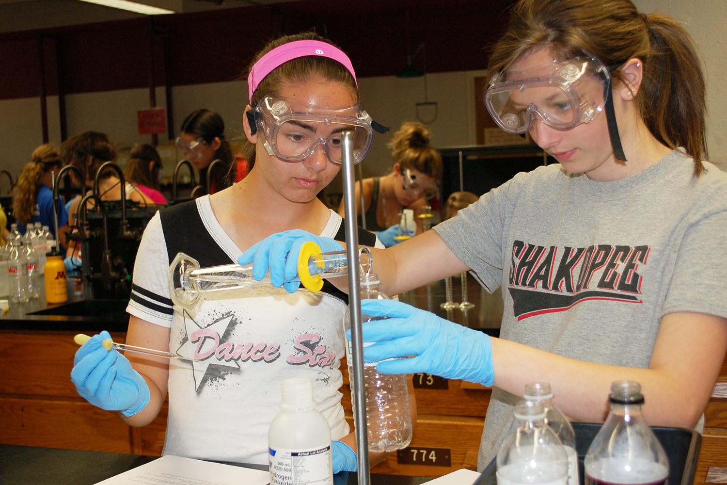 Two girls partaking in a STEM summer camp