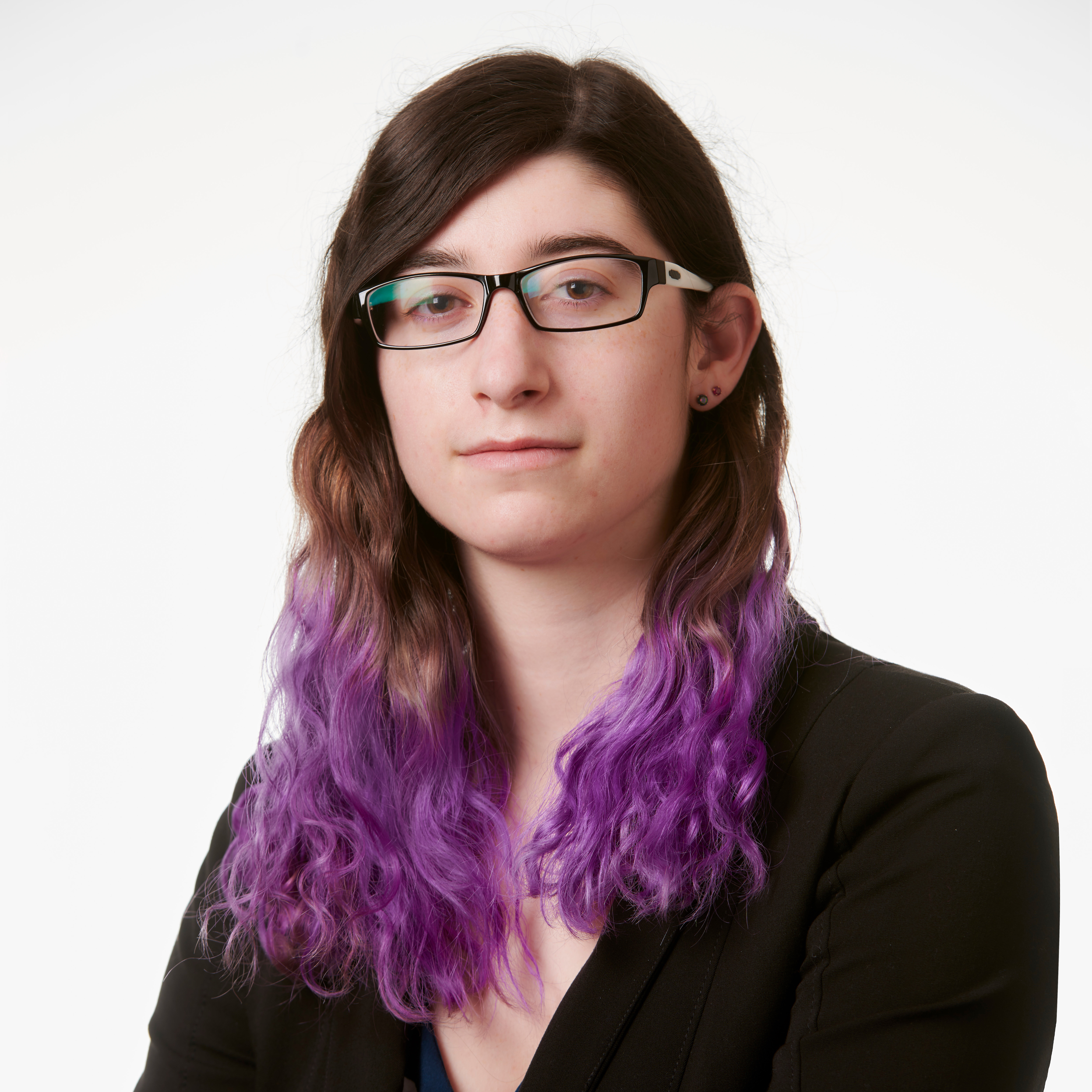 Person with long brown hair that's purple at the end with glasses 