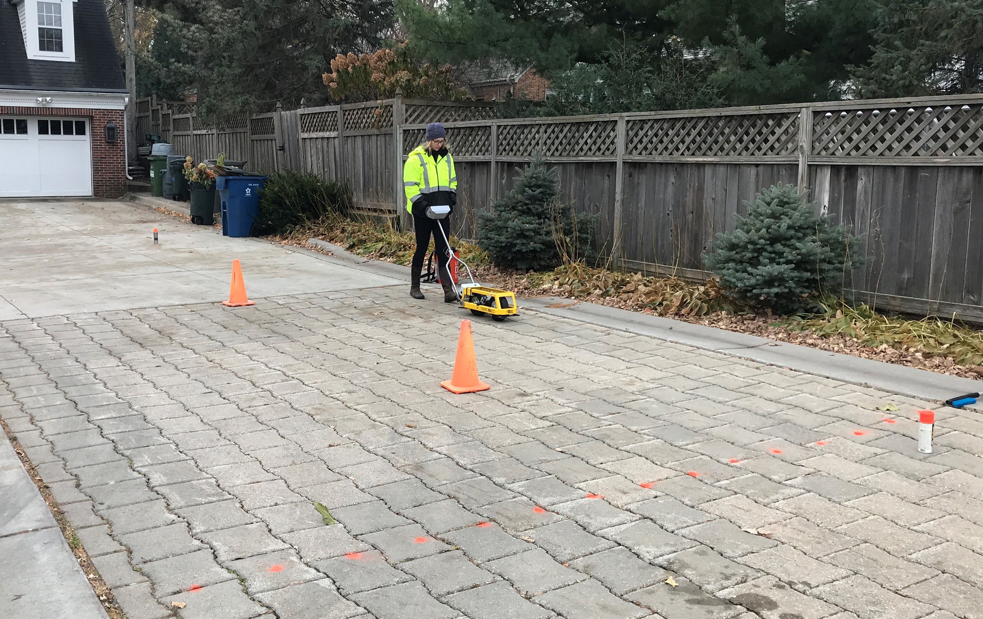 Katie Kemmitt collecting friction data on permeable pavement using a portable friction tester