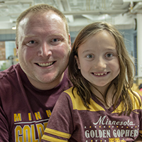 Kennedy with his daughter at a STEM camp