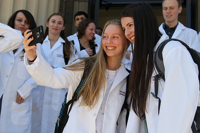 new chemistry majors celebrate receiving their lab coats