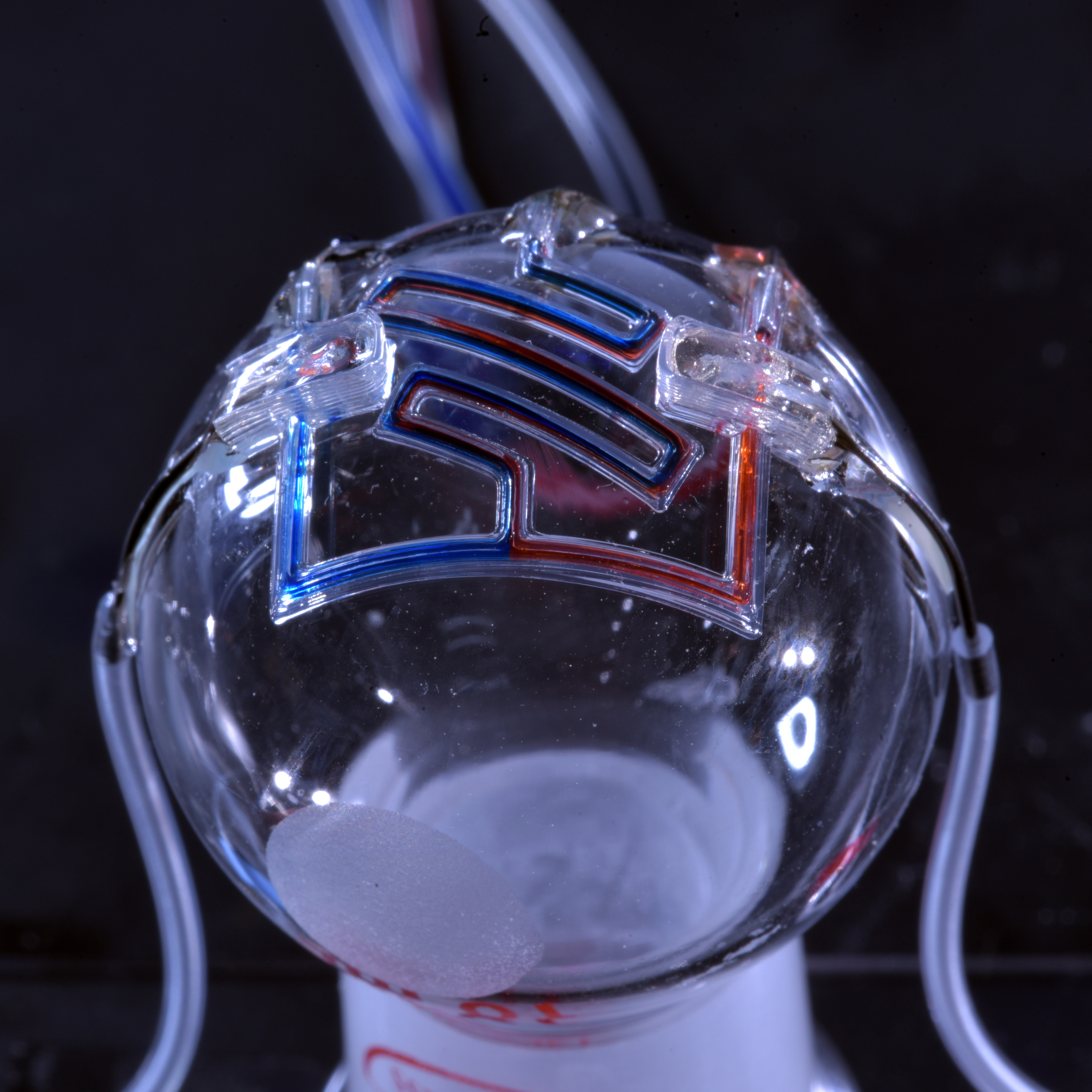 Michael McAlpine's group is first to 3D print microfluidic channels on a curved surface
