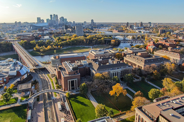 Overhead shot of Minneapolis campus, the Mississippi River, and downtown Minneapolis