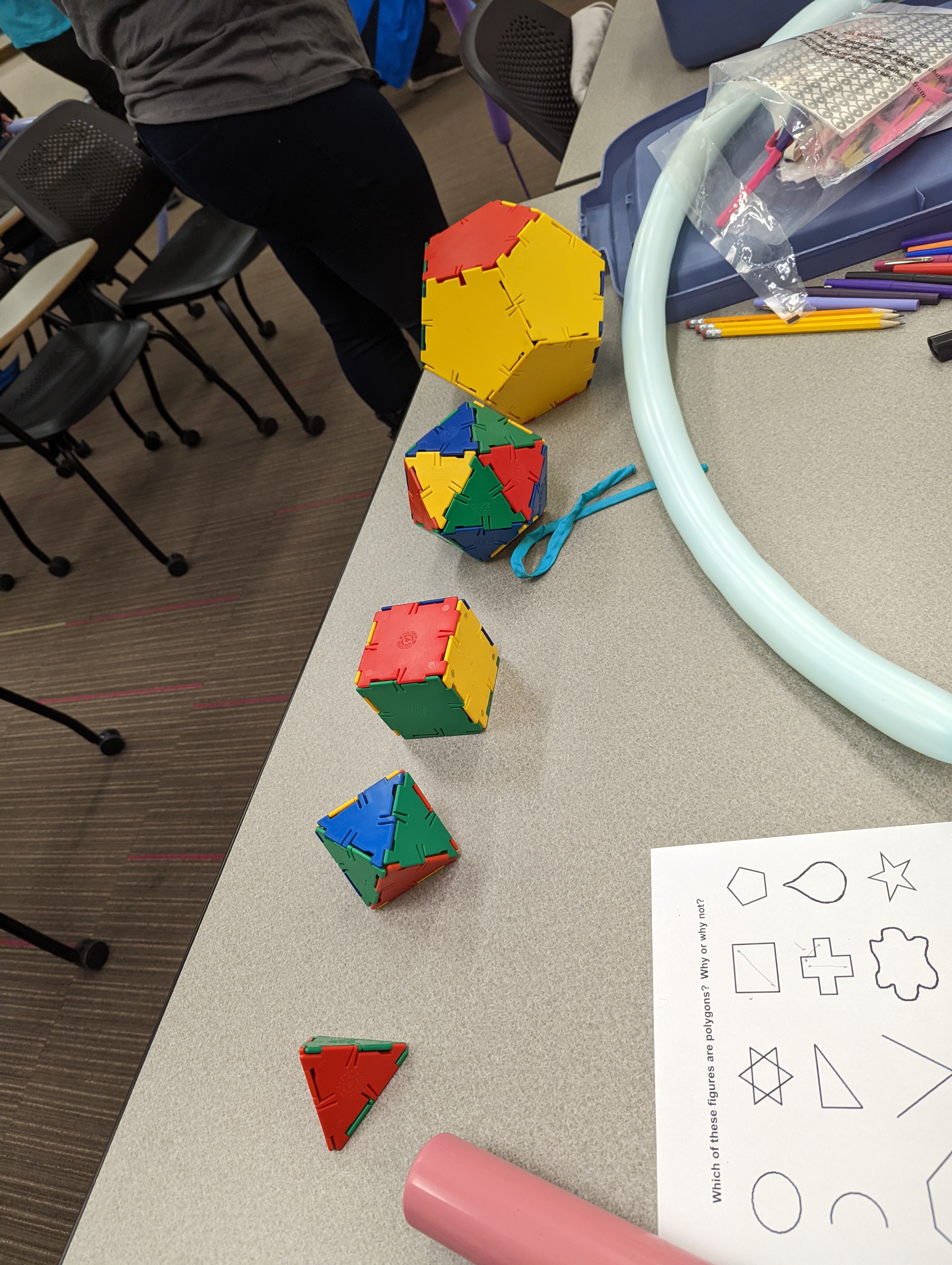 The five platonic solids, assembled using plastic tiles called polydrons