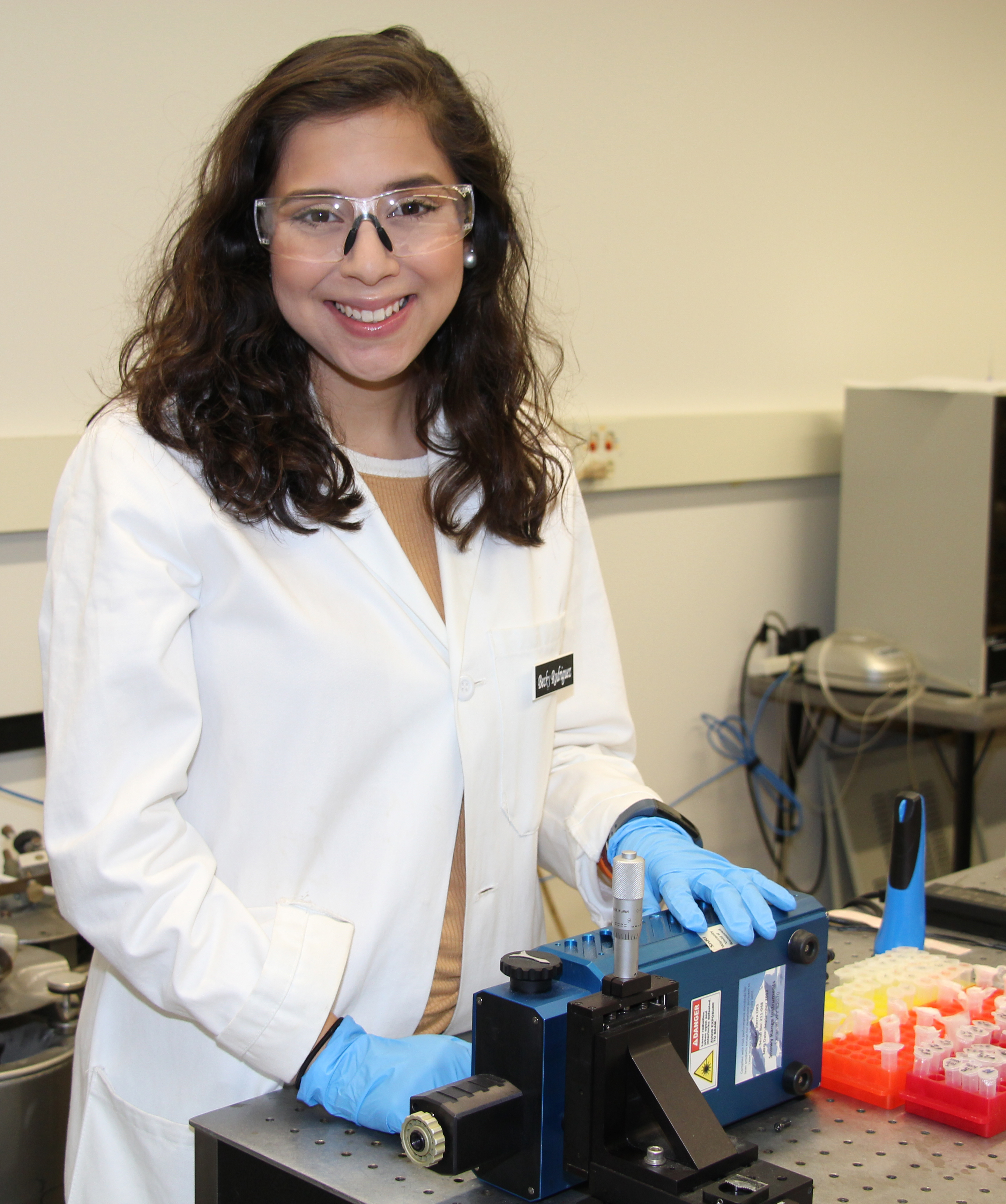Rebeca Rodriguez, scientist, in lab coat