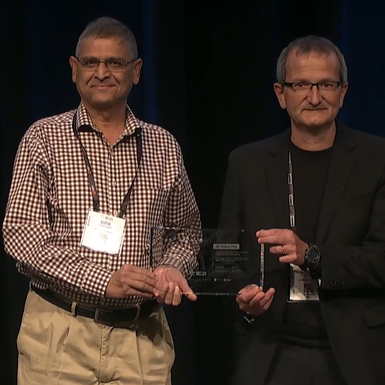 Vipin Kumar and George Karypis accepting the 2021 Test of Time Award at the 2021 Supercomputing Conference