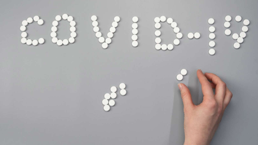Covid-19 spelled out in pills