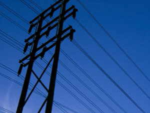 power line against dark blue sky