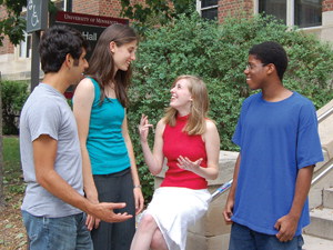 students talking outside of Lind Hall