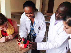 Surgeons in Kampala, Uganda, examine the first of an upcoming series of low-cost surgical trainers called Medjules
