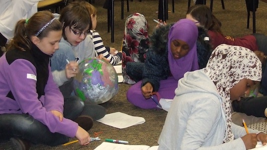 Students learning spherical geometry