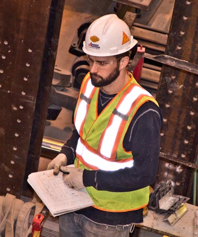 Graduate student Ben Dymond oversees a pour in the Theodore V. Galambos Structural Engineering Laboratory.