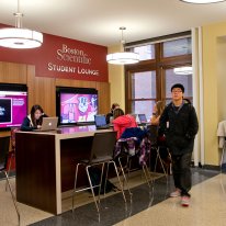 A student walks through the Boston Scientific Student Lounge in Lind Hall