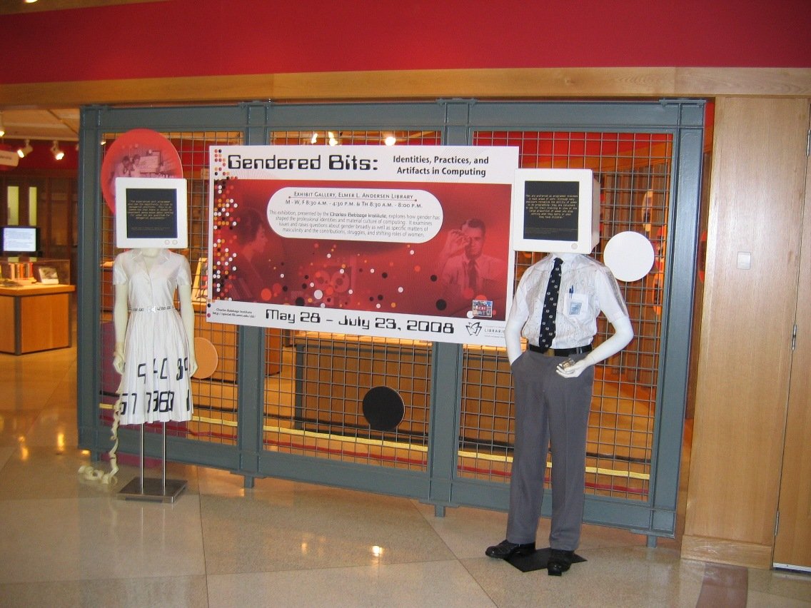 Gendered Bits exhibit sign with mannequins