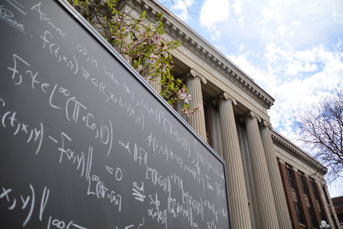 Math written in chalk on blackboard in front of Vincent Hall.