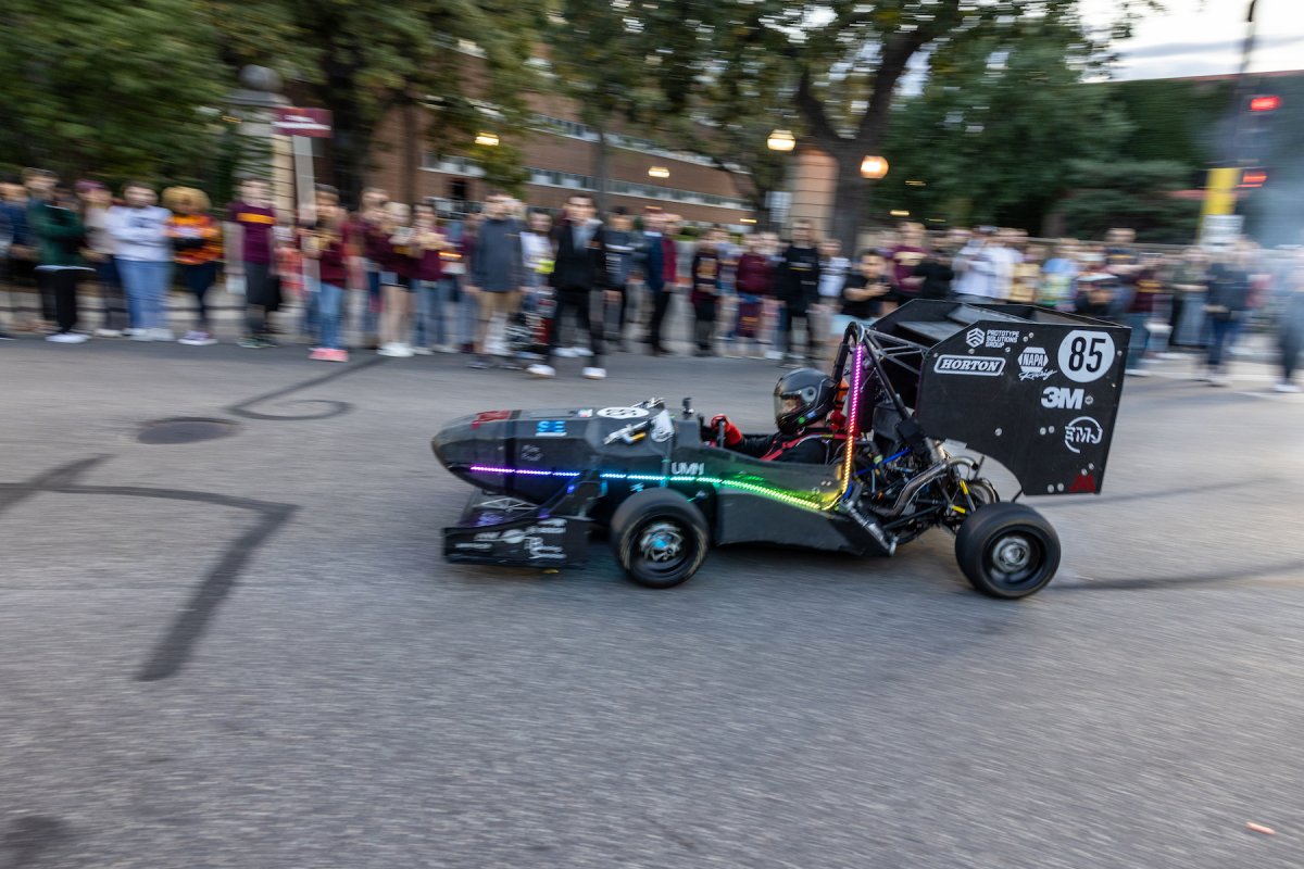 Formula car in the homecoming parade