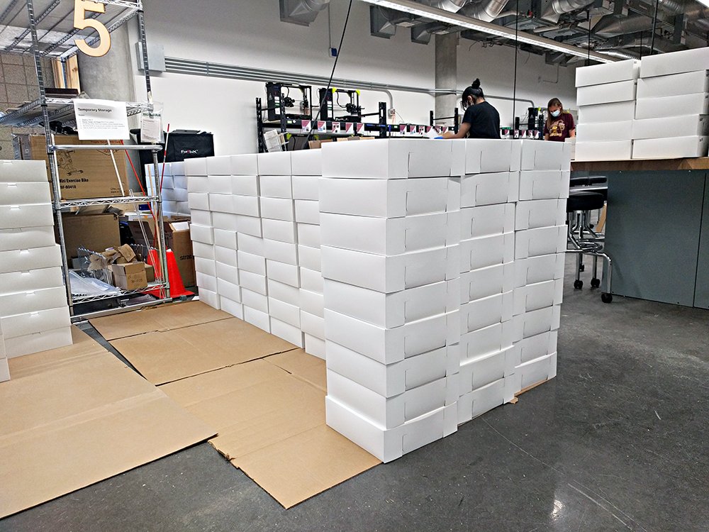 A stack of white boxes in Anderson Labs.