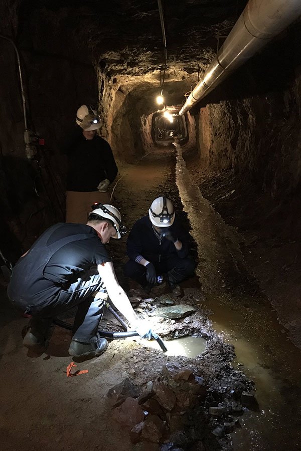faculty and staff collecting samples in Soudan Mine, MN