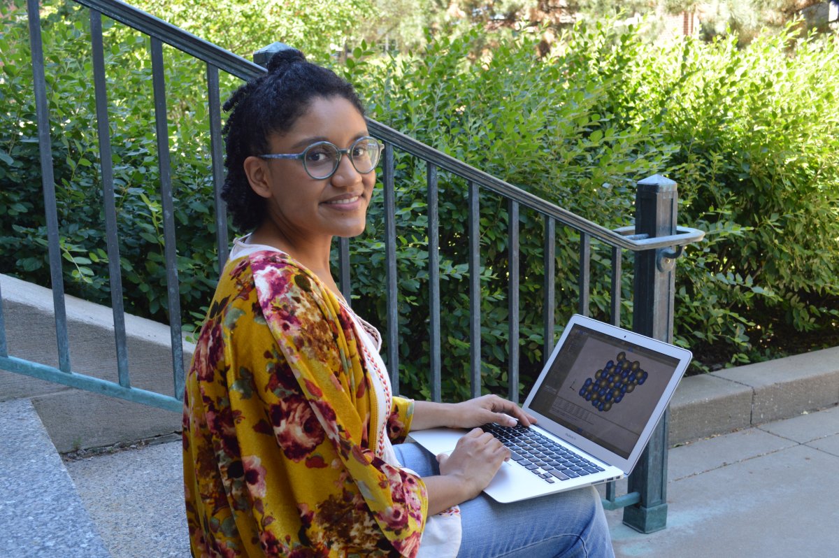 CSE grad student Brianna Collins poses on the steps of Walter Library