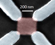 A nickel-iron alloy magnetic particle made by e-beam lithography with four nonmagnetic leads attached for electrical transport measurements.