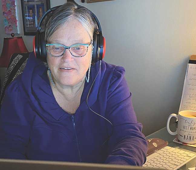 Eileen Harvala working on computer