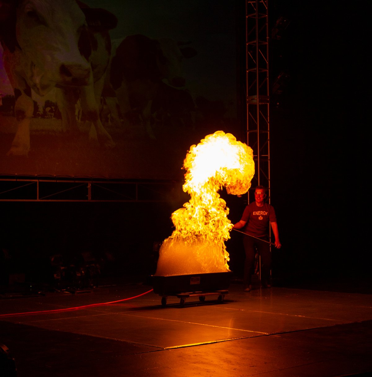 Professor Lee Penn lights a methane bubble bath on fire at Energy and U 2023.