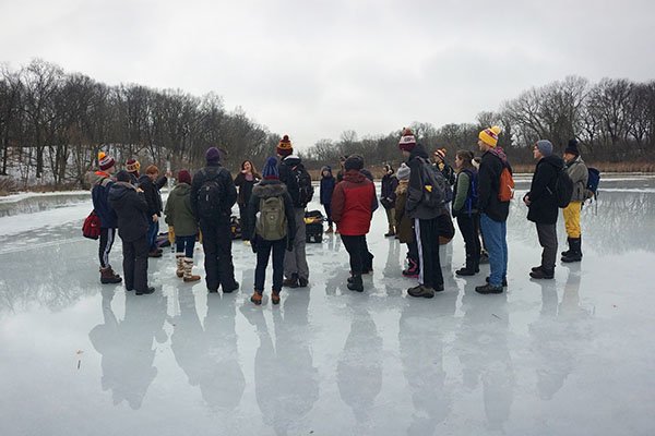 Photo of class instruction on a frozen lake.