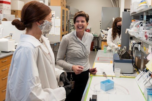 Brenda Ogle with a student in the lab