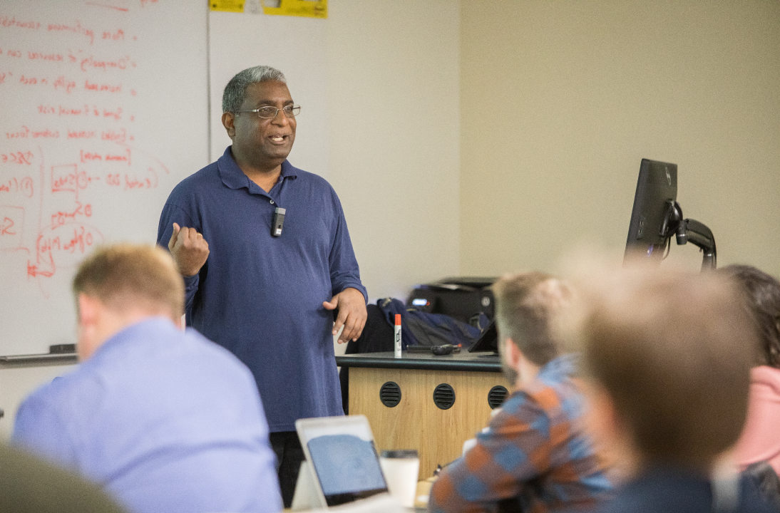 Photo of an MOT faculty member teaching in a classroom