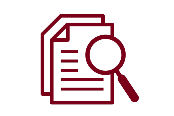 Maroon paper icon with magnifying glass