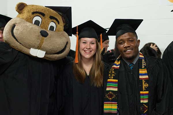 Graduates with Goldy