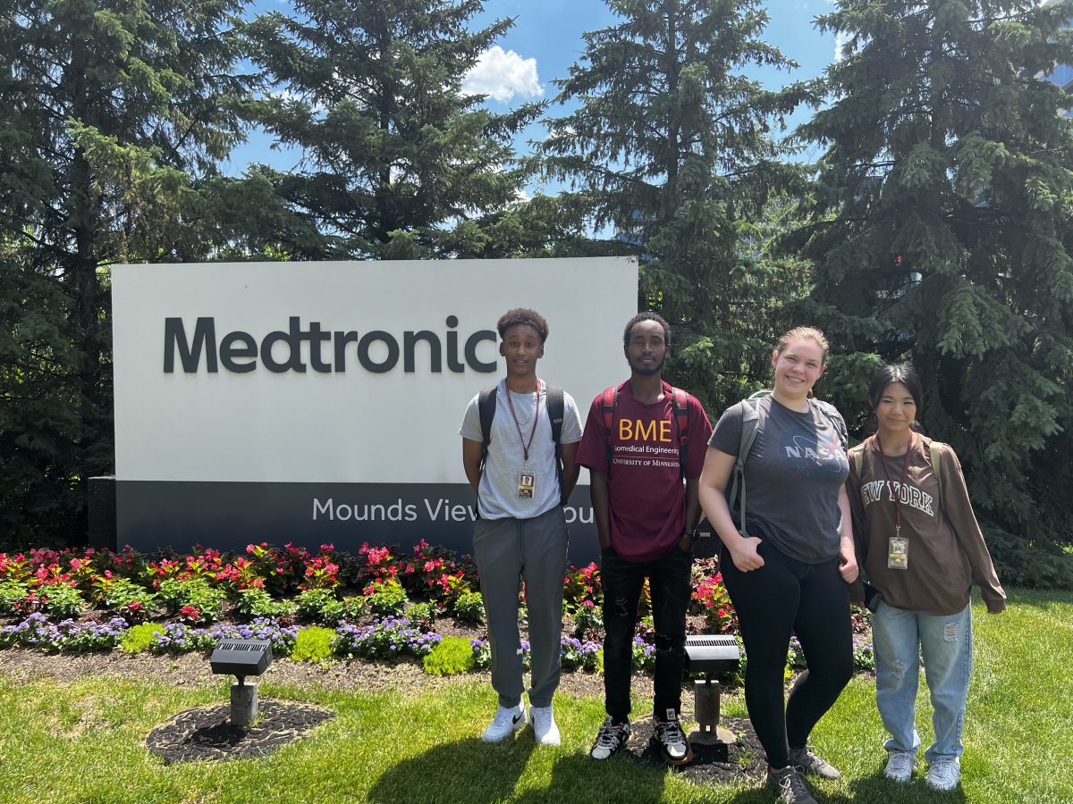 Students in front of Medtronic sign