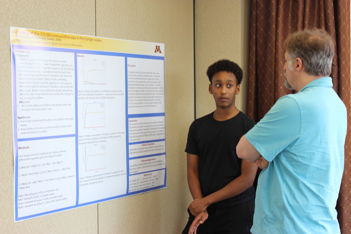 Student presenting poster