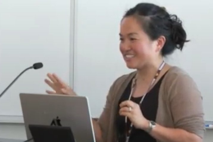 Kyoko Yoshida speaking at an event