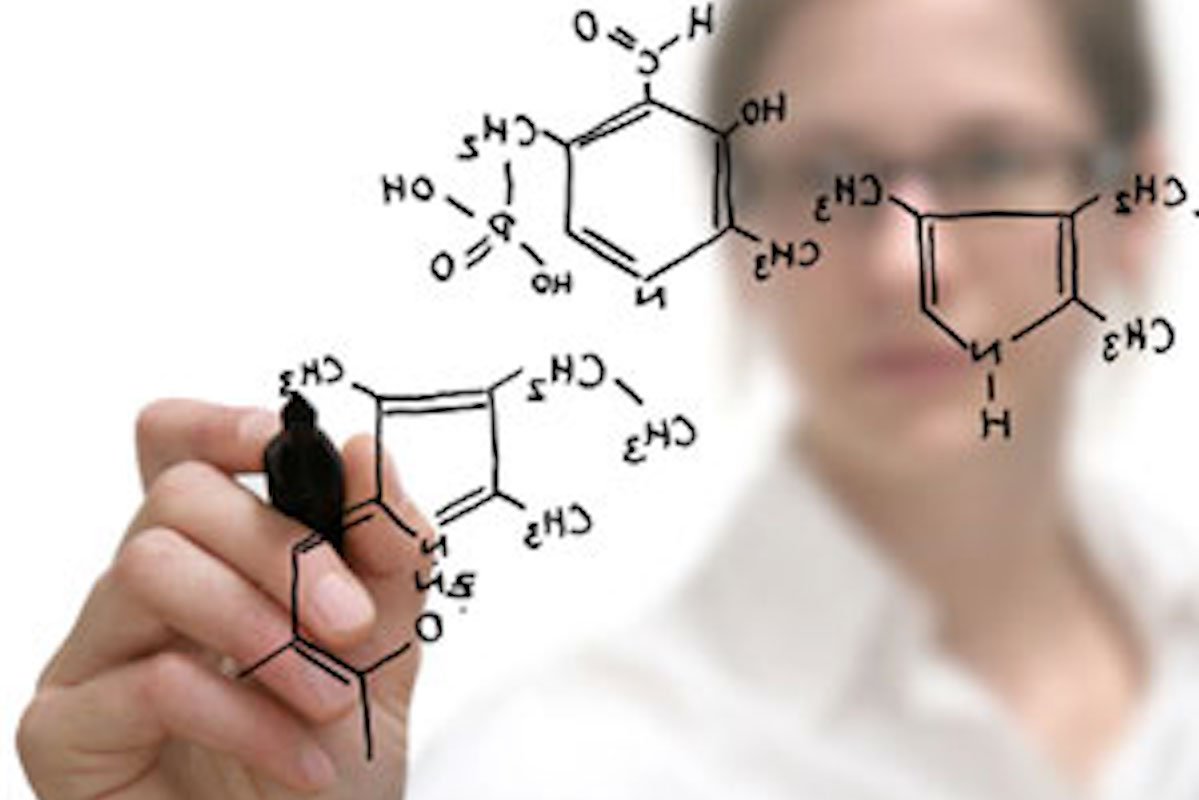Woman drawing molecular structure