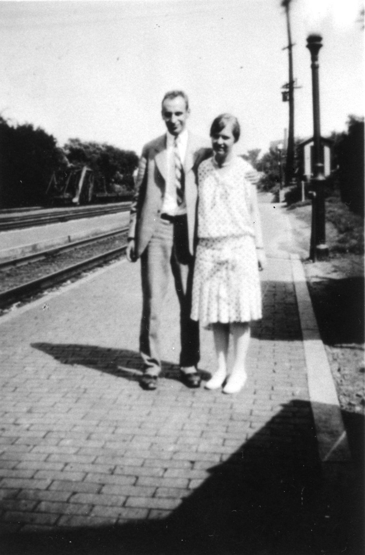 Man and a woman standing outside