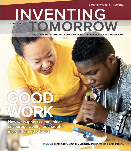 This cover image of the Winter 2020 magazine features two students looking at a pocket-sized robot.