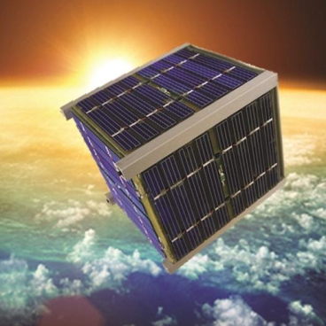 A depiction of a CubeSat floating above the Earth.