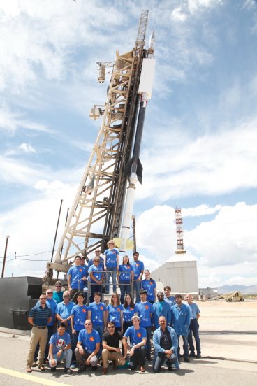 The FOXSI-3 team in front of the sounding rocket carrying FOXSI-3.