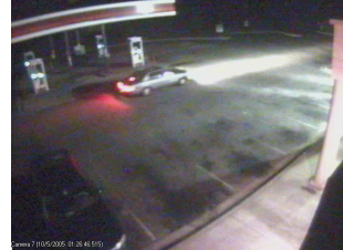 Surveillance video showing a car at a gas station