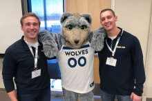CSE grad student Sam Walczak and friend Marc Richards with the Minnesota Timberwolves mascot