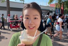 Sophia Sun poses at the MN State Fair with ice cream