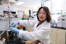 CSE grad student Yutong Pang putting samples into a micro-catalytic reactor