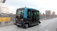 A driverless electric bus on the Washington Avenue bridge.