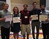 Johnny Carruth, Julia Quindlen, Victor Barocas, Chris Korenczuk, and Vahhab Zarei holding up awards from a conference.