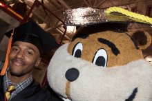 Graduate with Goldy at Commencement
